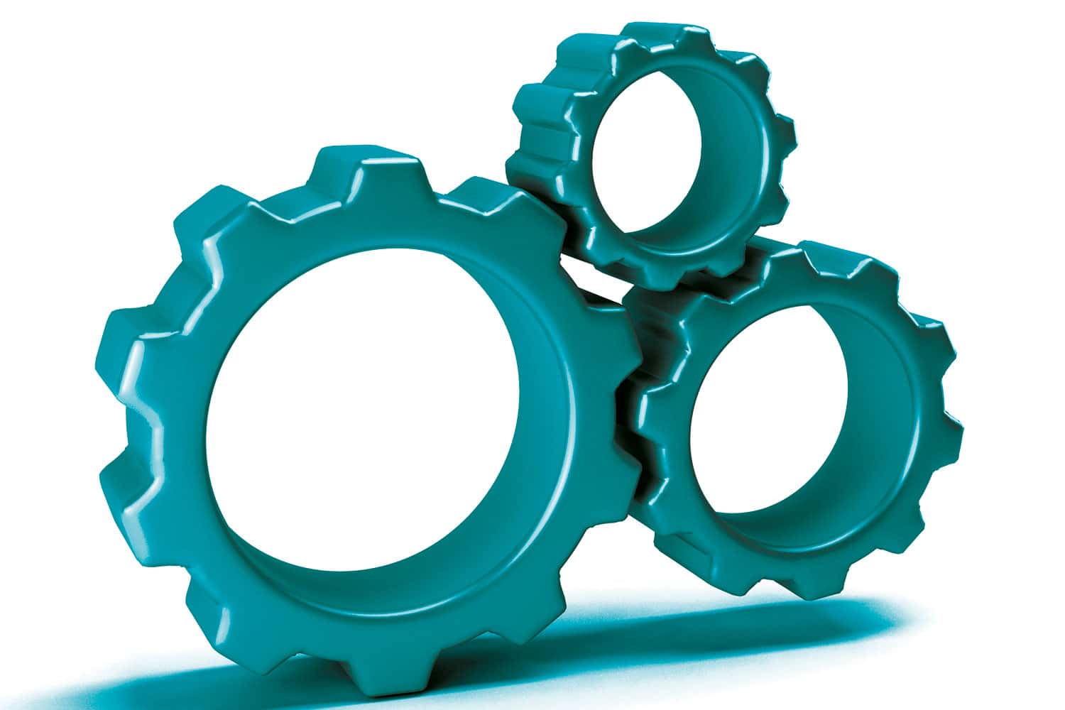three interlocked cogs of different sizes