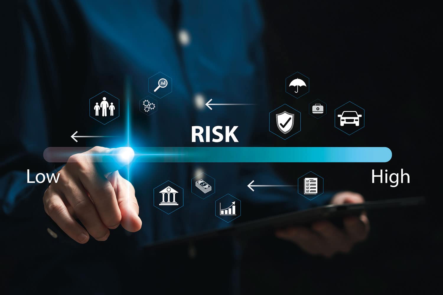 : graphic of hand and finger pointing onto screen displaying icons and words reflecting risk and finances